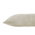Beige pillow on a white background