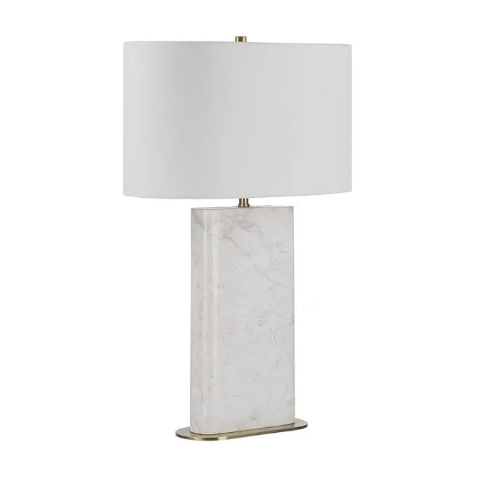 A white marble table lamp base with a natural honed finish, featuring a classic E26 socket, a dimmer switch, and an off-white linen shade, complemented by a brushed brass finished iron stem.