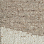 Close-up of a textured beige and white carpet