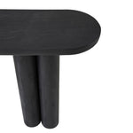 Black round dining table with cylindrical legs on a white background