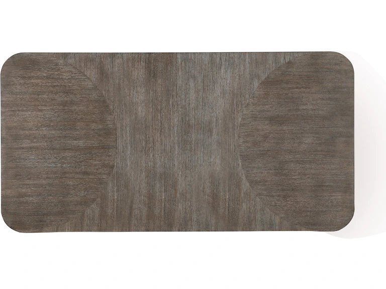 top of rectangular dining table with a dark wood finish on a white background