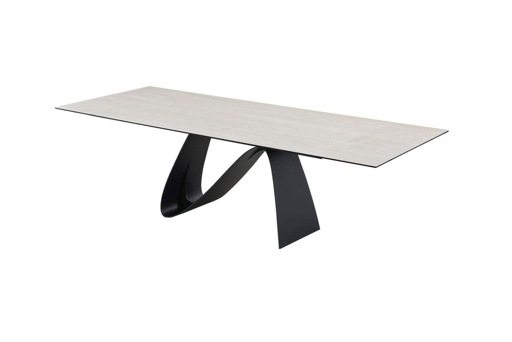 A contemporary extendable dining table with a white marble top and black base, shown in a fully extended state.