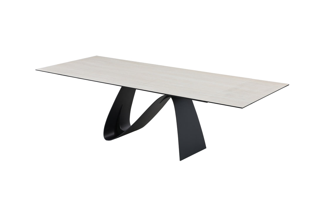 A contemporary extendable dining table with a white marble top and black base, shown in a fully extended state.