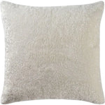 A square-shaped white shearling throw pillow.