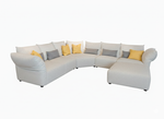 Sectional sofa with cushions on a white background