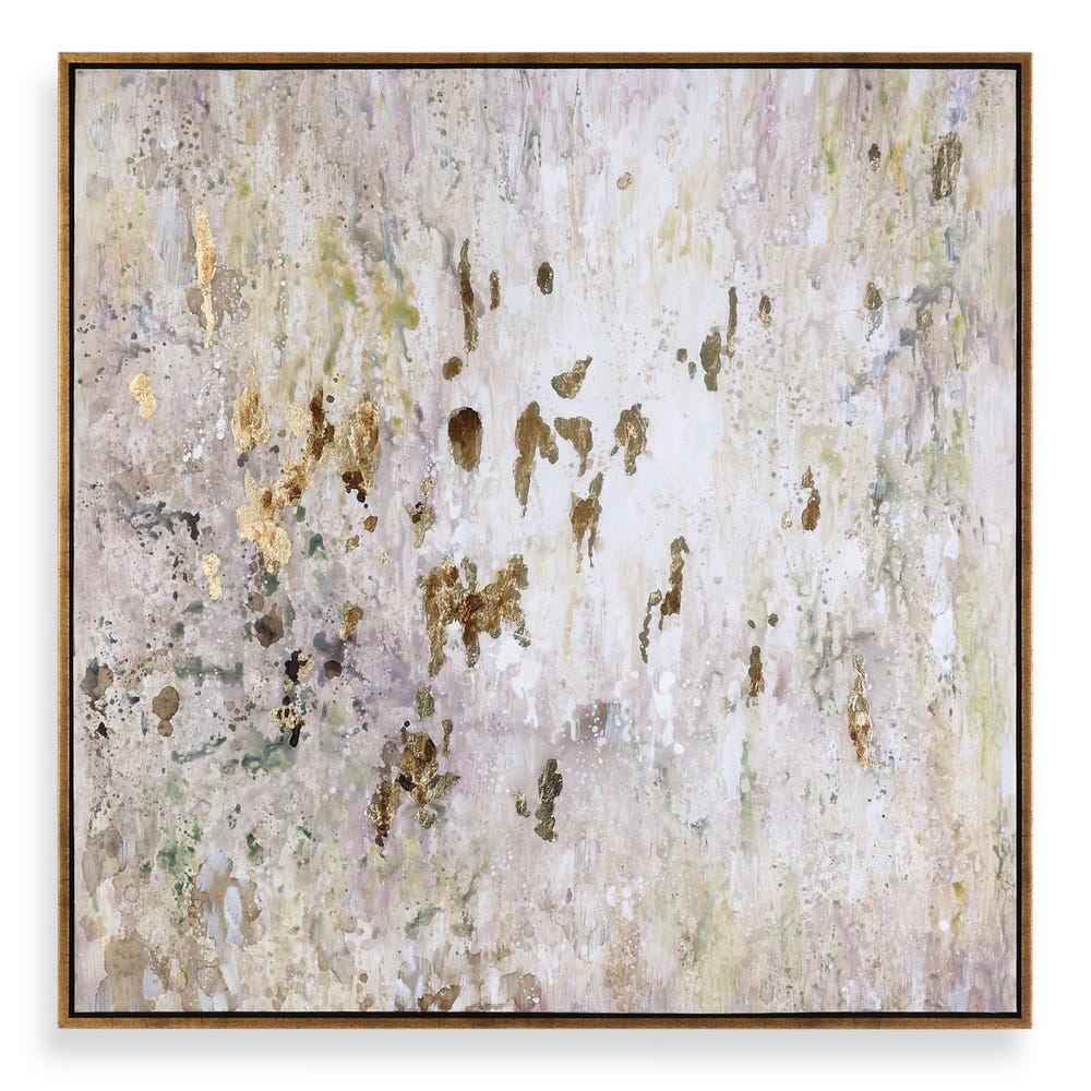 Abstract framed wall art featuring a textured, distressed background in soft cream, beige, and off-white tones with scattered metallic gold leaf accents and subtle gray-green veining, enclosed in a thin dark brown frame.