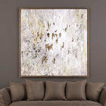 Abstract art painting on a wall above a brown sofa