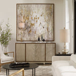 Modern living room with abstract art, sideboard, and white sofa.