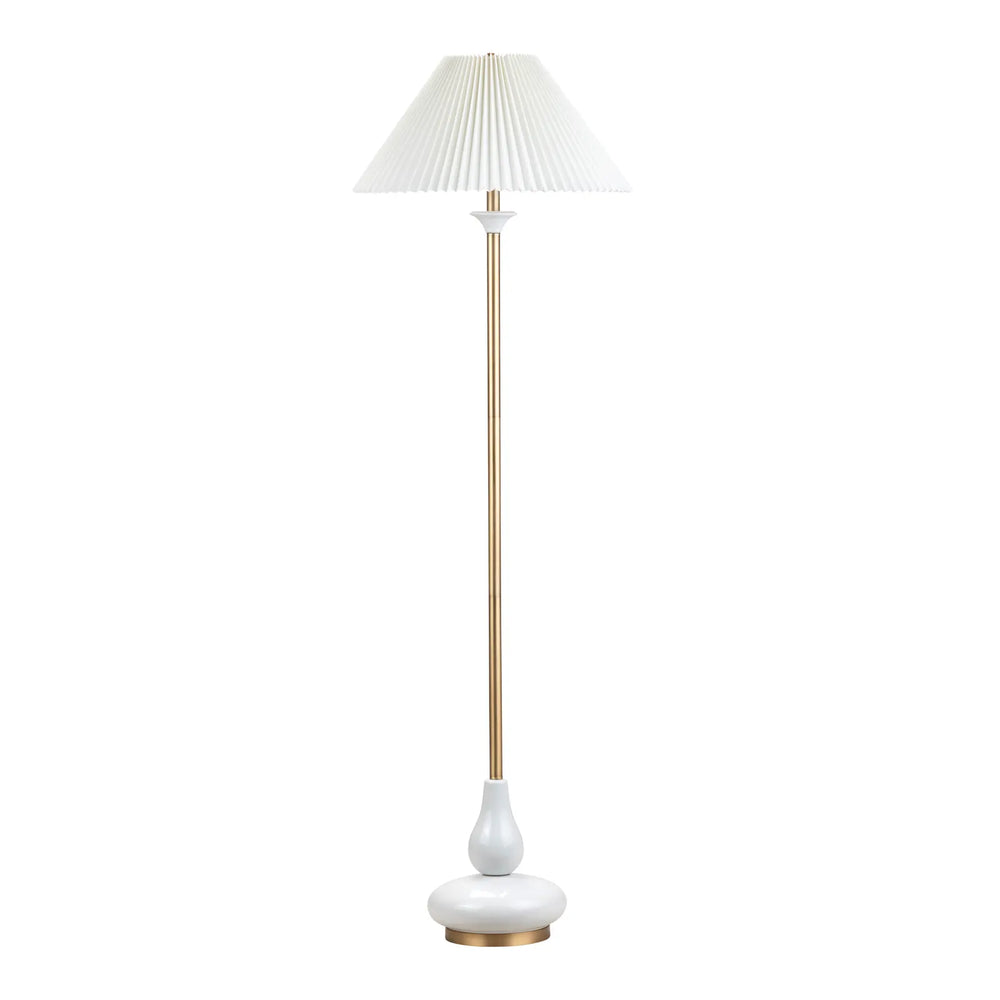 Floor lamp with white pleated shade and gold base on a white background