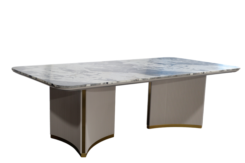 Marble-top dining table with wicker sides on a white background