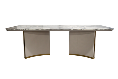 Marble-top dining table with curved base on a white background