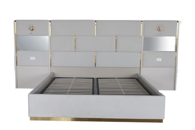 Modern bed with metallic accents on a white background