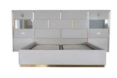 Modern bed with a metallic headboard on a white background