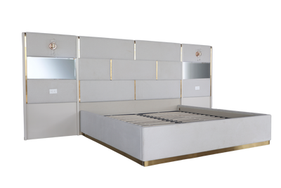 Modern bed with a metallic headboard on a white background