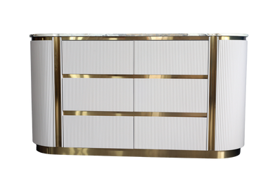 Modern reception desk with gold accents on a white background
