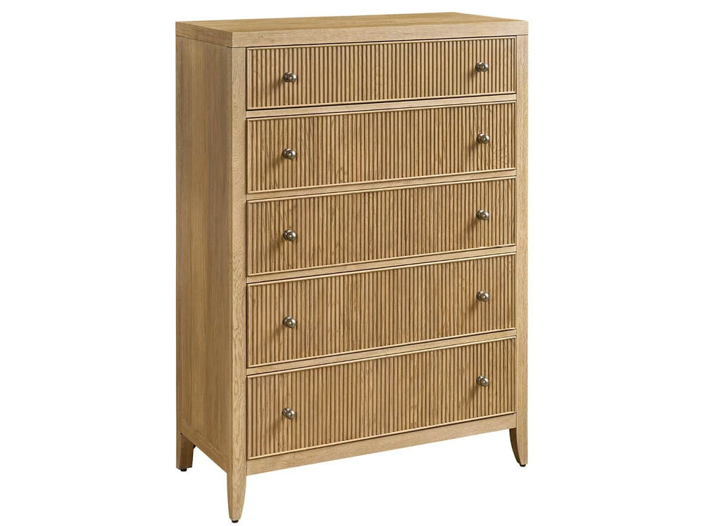 A beige wooden chest of drawers with five drawers, each having a handle on the right side.