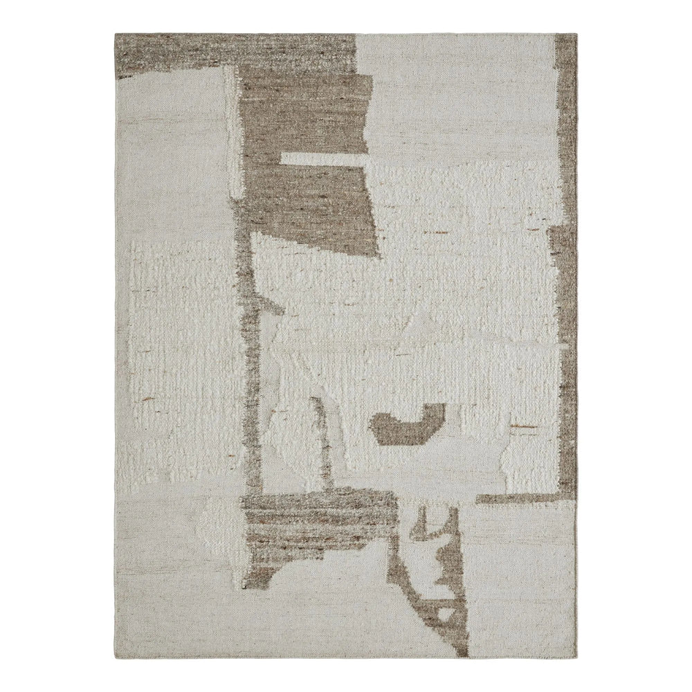 Textured area rug with abstract pattern on a white background