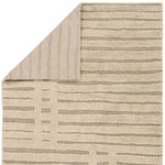 Beige and brown striped rug corner on a white background