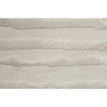 Close-up of a textured beige fabric with horizontal lines