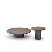 Two round wooden tables on a white background