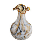Decorative vase with gold and black accents on a white background