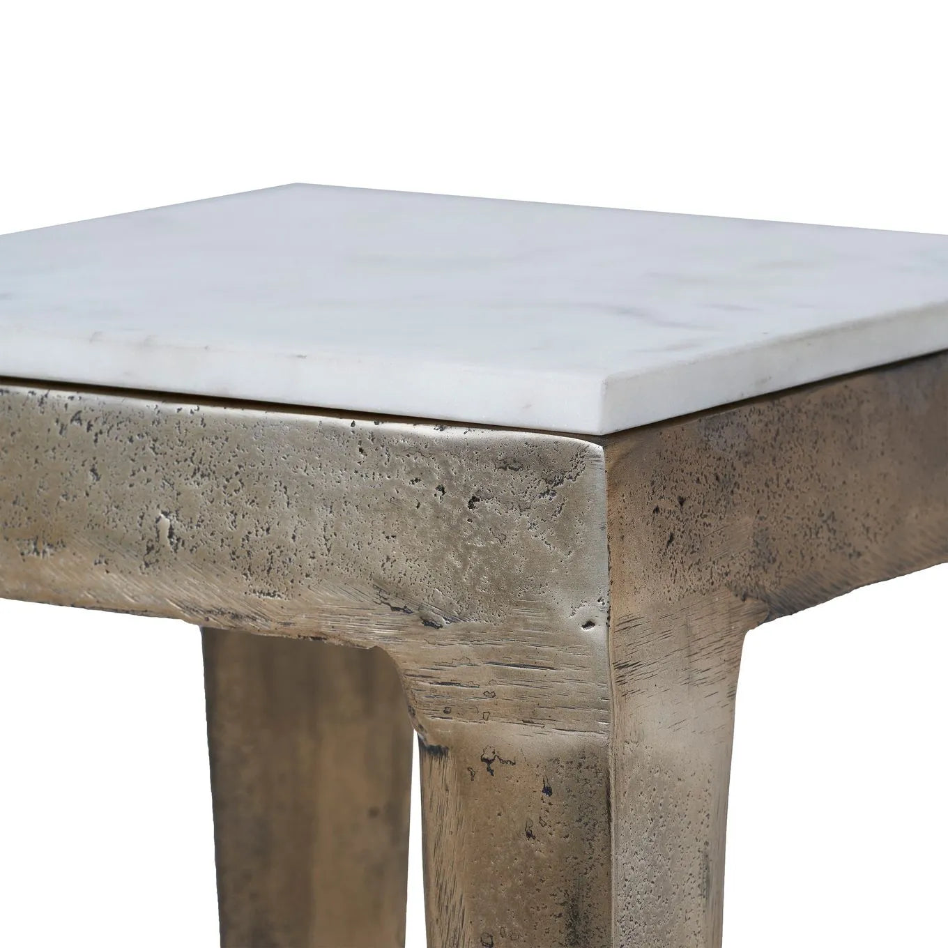 A square brass end table with a white marble top, having visible grain and patterns on the surface.
