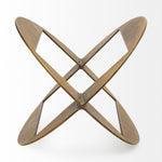 A round,glod metal decorative object with a geometric design.