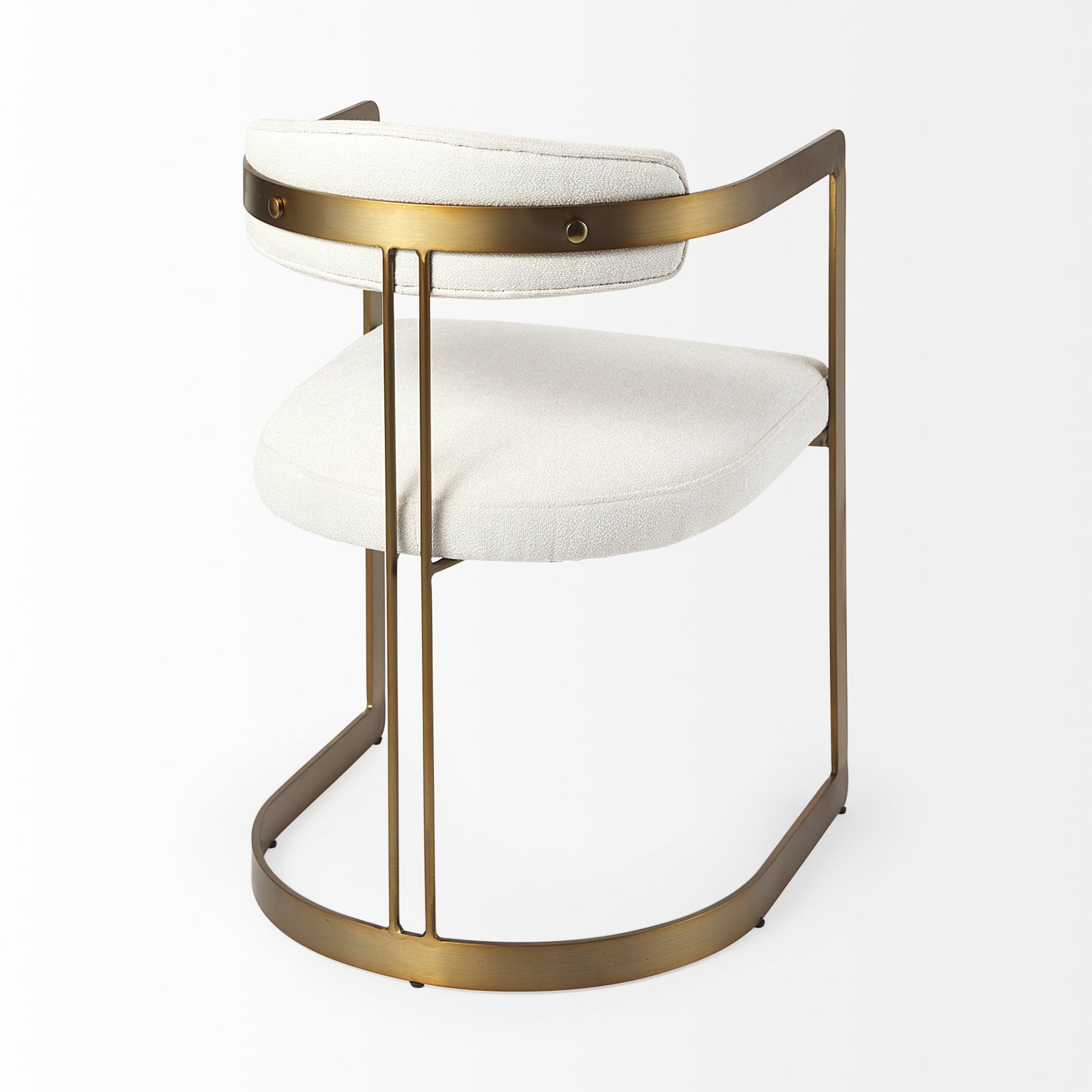 Chair with white cushioned seat and backrest on a gold metal frame against a white background
