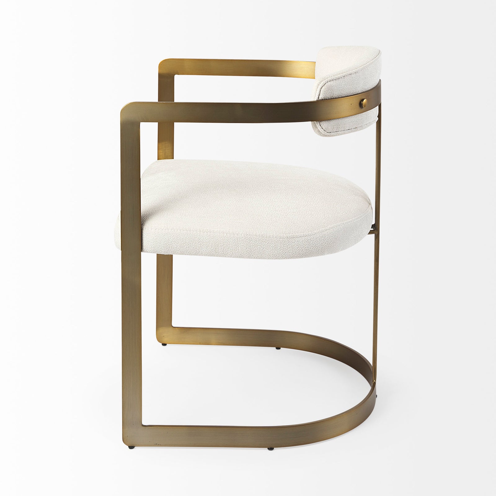 Chair with white cushioned seat and backrest on a gold metal frame against a white background
