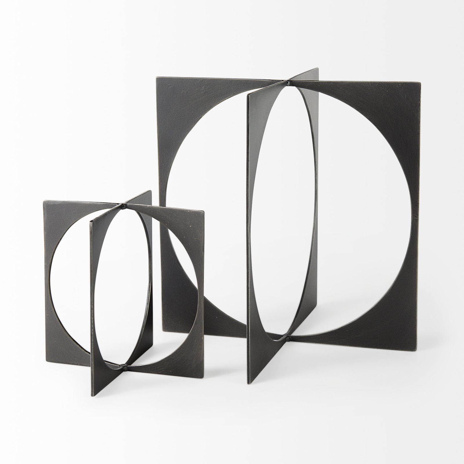 Bronze decorative object with geometric design on a white background