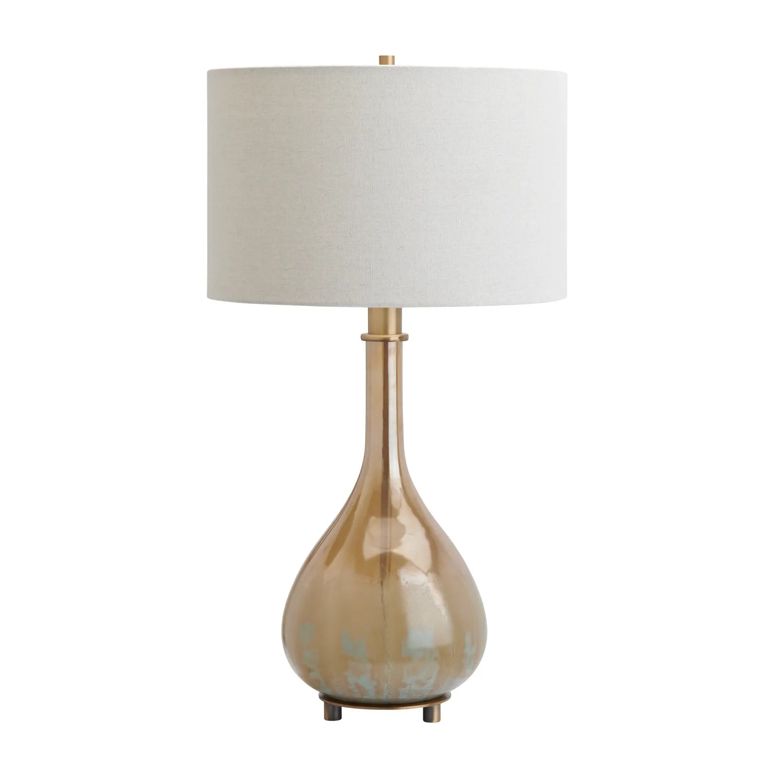 A table lamp with a tapered drum shade in off-white fabric, a metallic gold stem, and a pear-shaped glass base in a warm champagne-gold tone with subtle light blue floral detailing near the bottom, set against a plain white background.