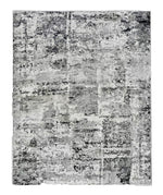 Gray and white textured area rug on a white background