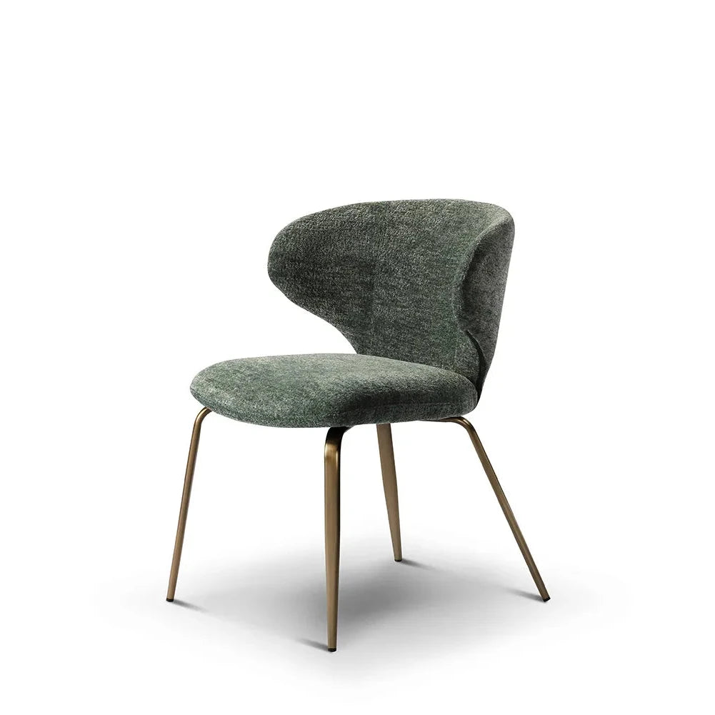 Green upholstered chair with gold legs on a white background