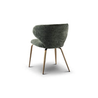 Green upholstered chair with wooden legs on a white background