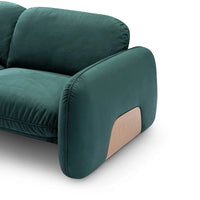 Green armchair with a brown patch on a white background