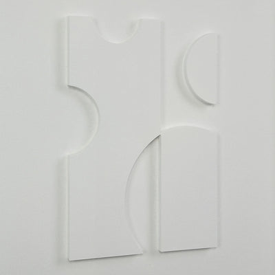 Abstract white sculpture on a light gray background