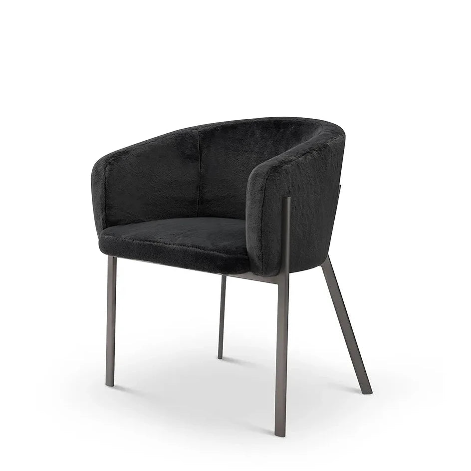 Black armchair with metal legs on a white background