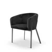 Black armchair with metal legs on a white background