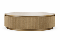 Round wooden coffee table with a white top on a white background