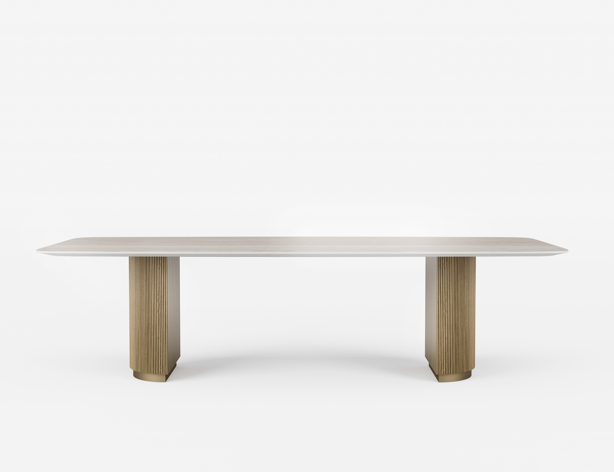 Modern dining table with a light wood finish on a white background
