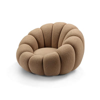 Beige, textured chair with a unique design on a white background