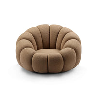 Brown cushioned chair with a unique design on a white background