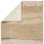 Beige textured rug corner on a white background