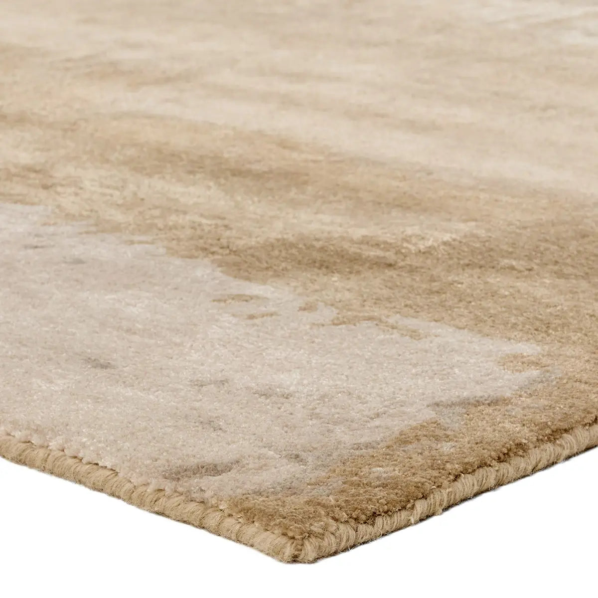 Beige and brown gradient rug on a plain background