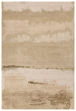 Beige and brown abstract patterned rug