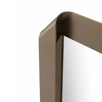 Close-up of a brown metal frame corner on a white background