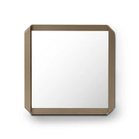 Square mirror with a bronze frame on a white background