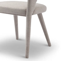 Close-up of a gray upholstered chair with wooden legs on a white background