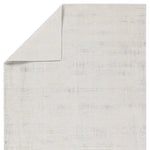 Textured gray rug with a subtle pattern on a white background