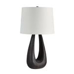 Table lamp with a dark wooden base and white lampshade on a white background